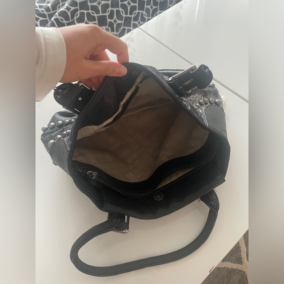 Just Cavalli
Leather handbag
good condition
Black, Leather - Picture 5 of 5